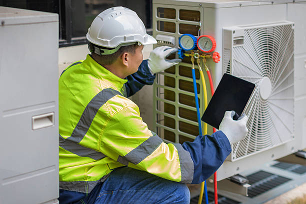 Professional Air Conditioning Repair technician working in Lakeland, MI
